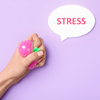 Female hand squeezing stress ball and word STRESS on color background