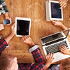 Family using new technology, overhead view