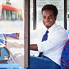 Portrait Of Bus Driver Behind Wheel