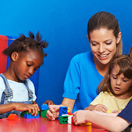 daycare worker with kids