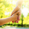 mom and daughter holding hands