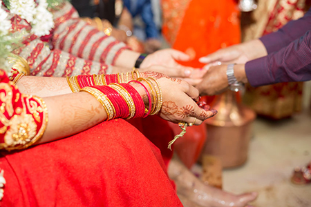 Hindu Nepali Bride and groom's Hands on the wedding day.