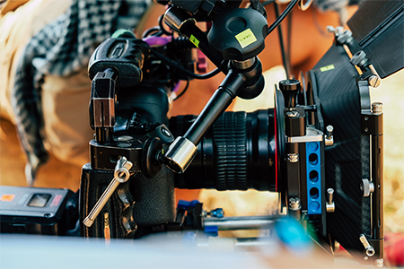 close up image of professional Camera on Film Set, Behind the scenes background, film crew productio
