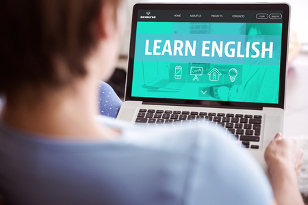 Learn English text on laptop
