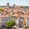 Aerial cityscape view on the old town with cathedral in Montpellier city during the sunny weather in
