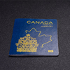 passport of a citizen of Canada on a dark concrete background