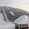 Winter landscape on the mountain with trees in the snow in the background