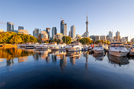 Toronto, Canada city skyline with Harbourfront at dawn on Lake Ontario