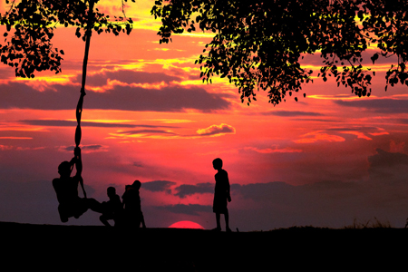 Silhouette Photo of Children Playing