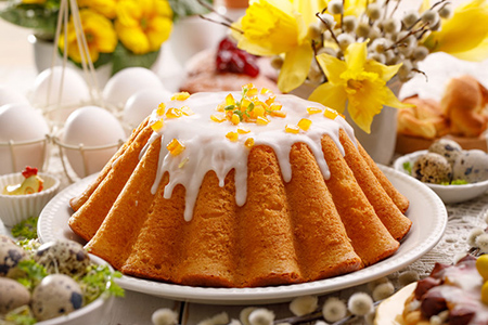 Easter yeast cake with icing and candied orange peel, delicious Easter dessert, traditional Easter p