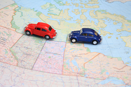 toy cars on map of canada