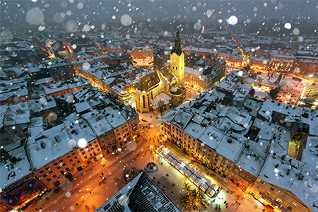 Picturesque christmas evening view on city center from top of town hall, Lviv, Ukraine.