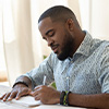 Man studying in front of computer