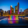 View of Nathan Phillips Square and Toronto Sign in downtown at night, in Toronto, Ontario