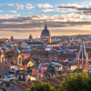 Italy, Rome cityscape with historic buildings and cathedrals at dusk