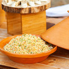 Vegetable Tajine with cous cous on wooden table