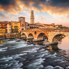 Verona, Italy Town Skyline on the Adige River with Ponte Pietra at dawn