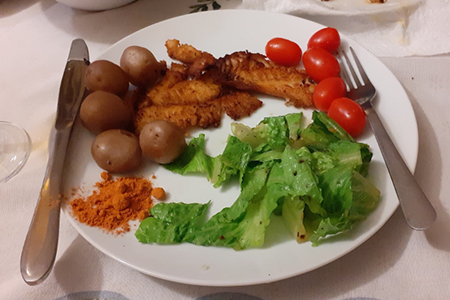 plate of fish and salad