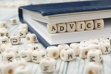 Wooden Blocks with the text Advice. Wooden ABC