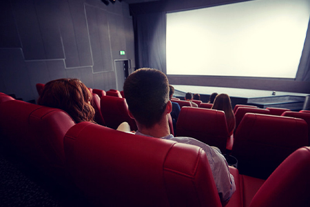 People sitting in a movie theatre