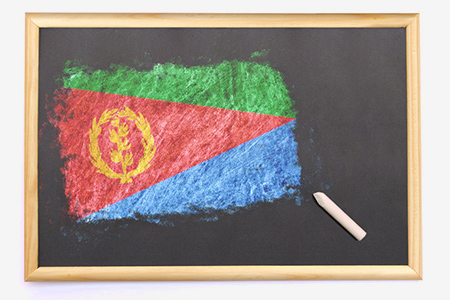 Blackboard with the national flag of Eritrea drawn on and a chalk