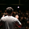 Person speaking to a crowd