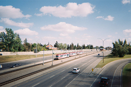 Car Travelling On Road, Calgary, AB, Canada