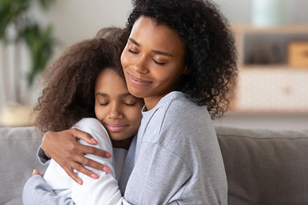 Sisters hugging each other