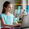 student girl having online class on laptop at home