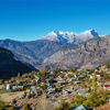 Mountain village with the view of Himalayas