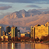 vancouver cityscape with grouse mountain in background