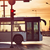 Bus moving on the road in city in early morning