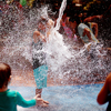 children Getting splashed by water