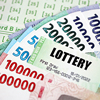 Green lottery tickets and money 