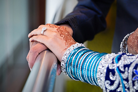 Brides hands grooms hands